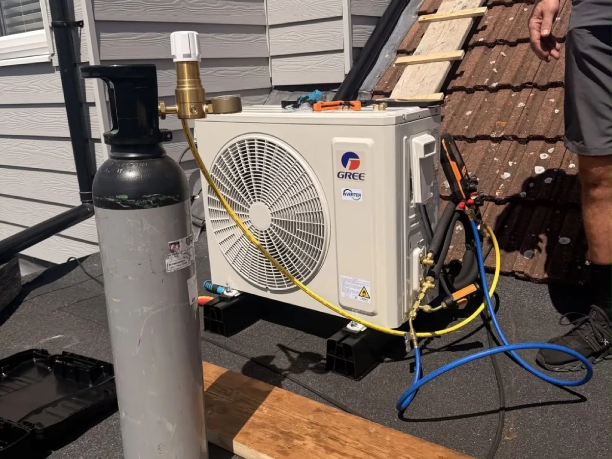 Dual outdoor air conditioning condensers with tidy pipework after a Perennia Climate Services install in Essex